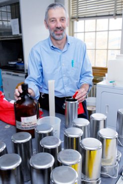 Dr. Martin Bide in textile assessment laboratory